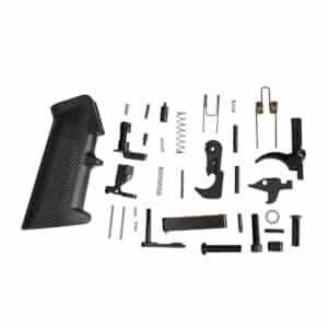 Collection of firearm parts including a black pistol grip, springs, and various metal components for assembly.