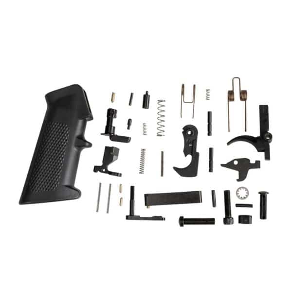 Collection of firearm parts including a black pistol grip, springs, and various metal components for assembly.