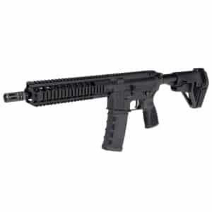 A black American-made AR-style pistol featuring a quad rail handguard and textured polymer magazine against a white background.