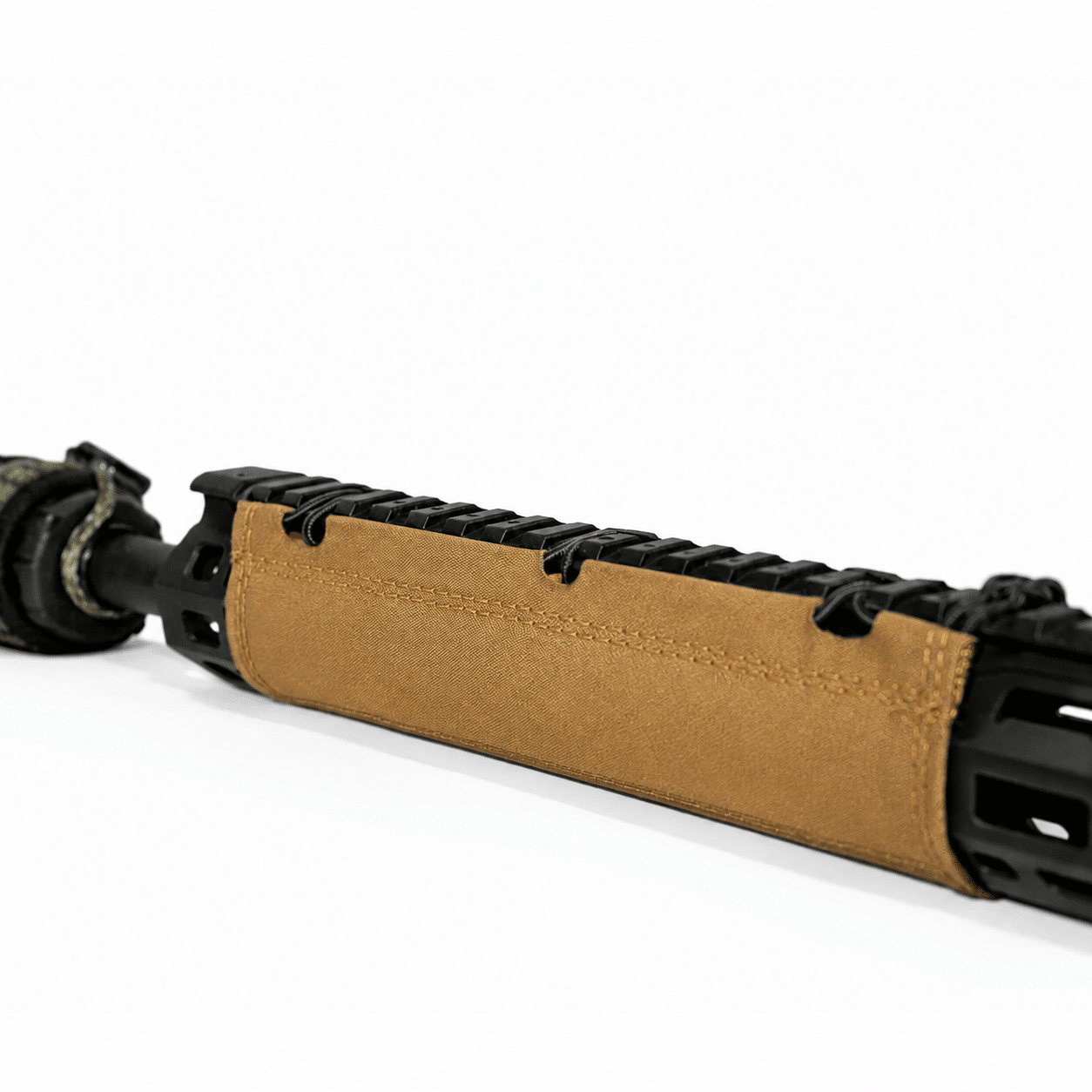 A durable coyote brown fabric rail wrap installed on a black rifle handguard, providing heat protection and a reliable grip for tactical shooting.
