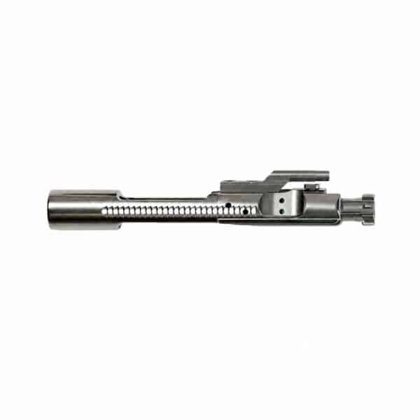 Close-up of a stainless steel firearm bolt carrier group showcasing precision craftsmanship and reliable design.